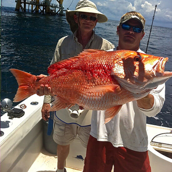 Red snapper caught on deep sea fishing charter.